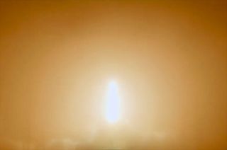 The plume from a SpaceX Falcon 9 rocket lights up a thick fog as the booster lifts off from Space Launch Complex 40 (SLC-40) at Cape Canaveral Space Force Station in Florida on Monday, March 4, 2024.