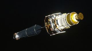 a long spacecraft in space.